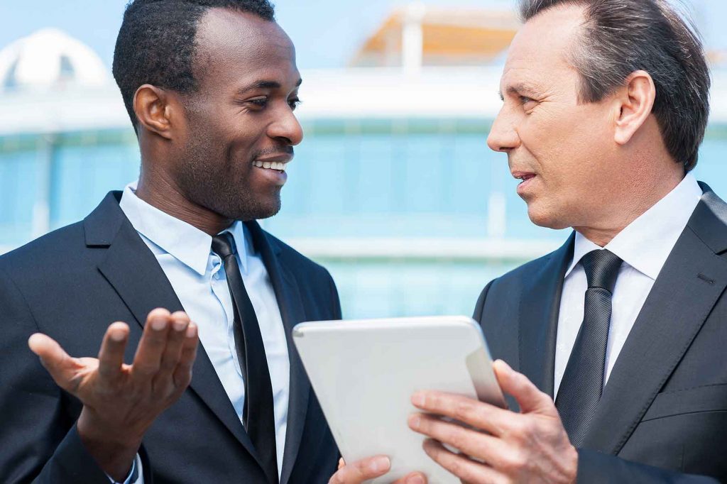 One Call Consultants executive consultation with industrial client